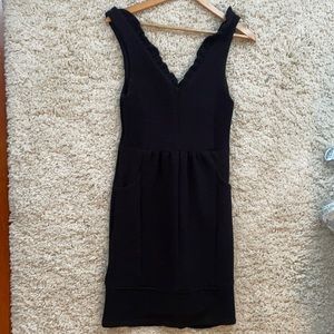 Cute black dress with pockets! New with tags
